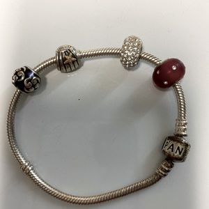 pandora bracelet with four charms